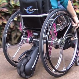 Wheelchair assist device