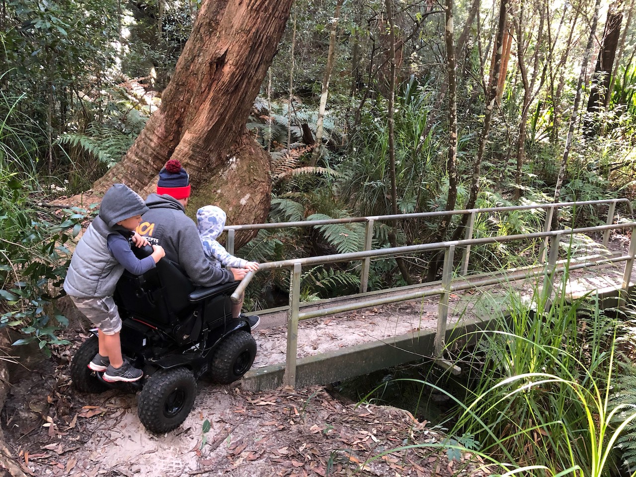 Dad in wheelchair with his kids